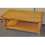 A modern oak coffee table, of rectangular form,