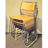 A group of five VG&P stacking chairs,