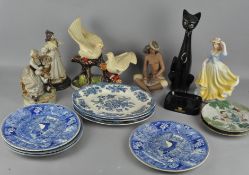 A box of assorted ceramics, including a cat,