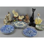 A box of assorted ceramics, including a cat,