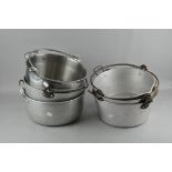 A group of jam/preserve cooking pans,