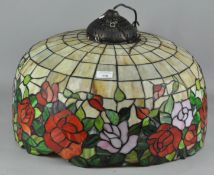 A large Tiffany style glass ceiling light shade,