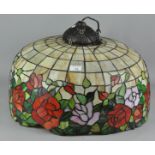A large Tiffany style glass ceiling light shade,