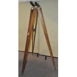 A large tripod stand,