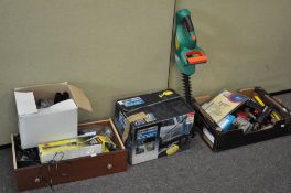 Four boxes of assorted tools, including a Black and Decker hedge trimmer,