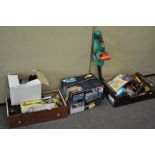 Four boxes of assorted tools, including a Black and Decker hedge trimmer,