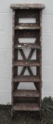 A wooden step ladder,