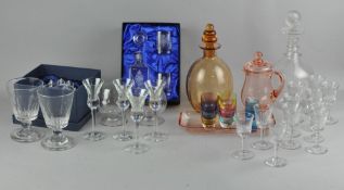A collection of assorted glassware, most drinking glasses,