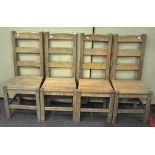 A set of four oak dining chairs,