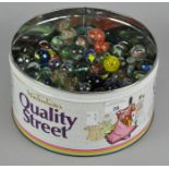 A large collection of vintage marbles of various shapes and sizes