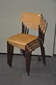 Four vintage stacking chairs,