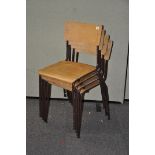 Four vintage stacking chairs,