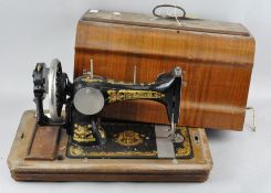 A Frister and Rossman sewing machine,