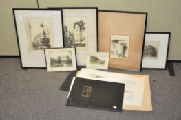 A collection of etchings, some framed, depicting various types of architecture,
