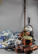 A collection of assorted items, including brass ware, bed pan,