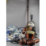 A collection of assorted items, including brass ware, bed pan,