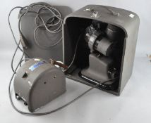 A Bell and Howell Model 615 projector and transformer,