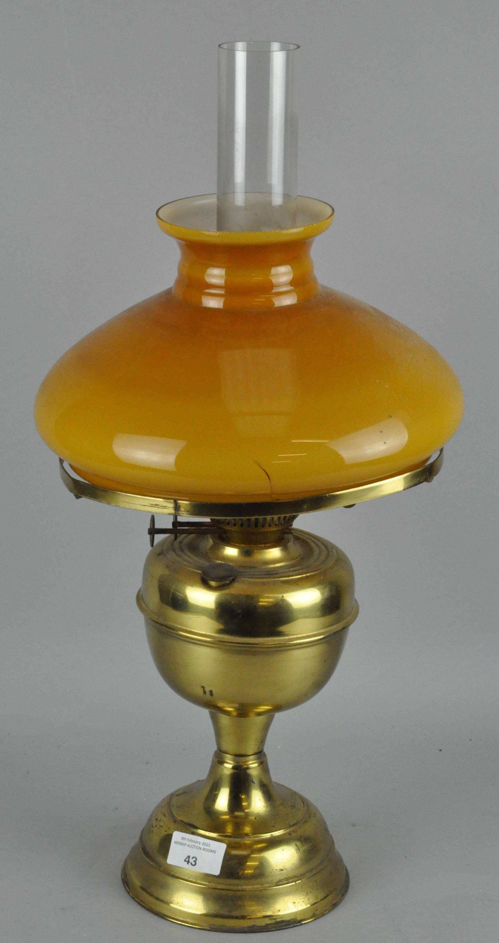 A vintage brass oil lamp, by Duplex, with glass shade and funnel,