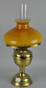 A vintage brass oil lamp, by Duplex, with glass shade and funnel,