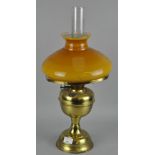 A vintage brass oil lamp, by Duplex, with glass shade and funnel,