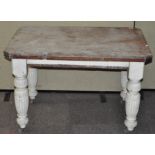 A Victorian painted small dining table, raised on four turned legs,