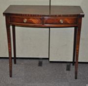 A mahogany hall/side table with two drawers to the front,