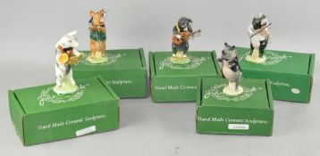 A group of Beswick musical pigs,