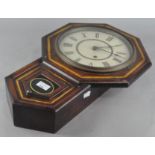 An early 20th century wall clock, by Seth Thomas, USA, in mahogany case,