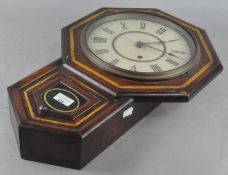 An early 20th century wall clock, by Seth Thomas, USA, in mahogany case,
