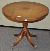 A vintage coffee table of circular form,