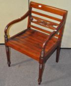 A Regency style elbow chair,