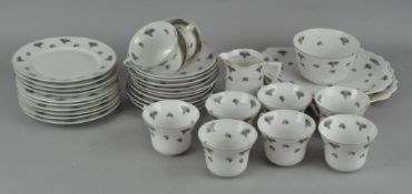 A 'Union K' porcelain part teaset, decorated with grapes, including teacups, saucers,