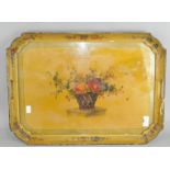 A Victorian papier mache drinks tray, with floral scene adorning the front,