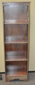 A mahogany standing bookcase with pierced sides,