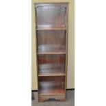 A mahogany standing bookcase with pierced sides,