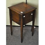 An oak sewing box, with opening top over a single drawer,