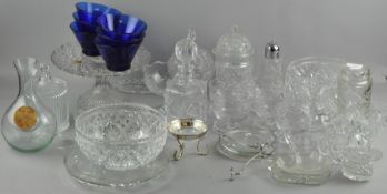 A large collection of assorted glassware, including sundae dishes, a decanter and more,
