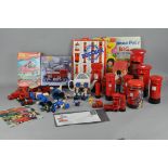 A group of assorted Royal Mail collectables , including tins,