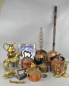 A collection of assorted brass ware, including small ship's lamps, a warming pan,