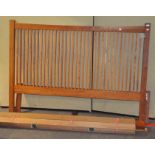 A modern wood slatted double bed frame, by New heights,