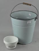 A vintage enamel bucket,