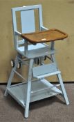 A blue painted metamorphic child's high chair,