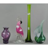 Four pieces of coloured glass, including a pink bird and three vases,