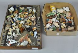 A collection of small ceramic figures,