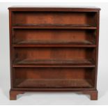 An Edwardian mahogany bookcase with four shelves,