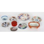 A collection of mainly Chinese porcelain, including bowls, dishes and boxes with covers,