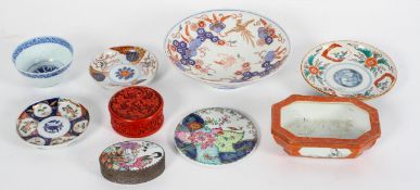 A collection of mainly Chinese porcelain, including bowls, dishes and boxes with covers,