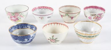 A collection of English tea bowls, mainly 18th century, porcelain and pearl ware,