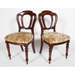 A pair of Victorian mahogany dining chairs,