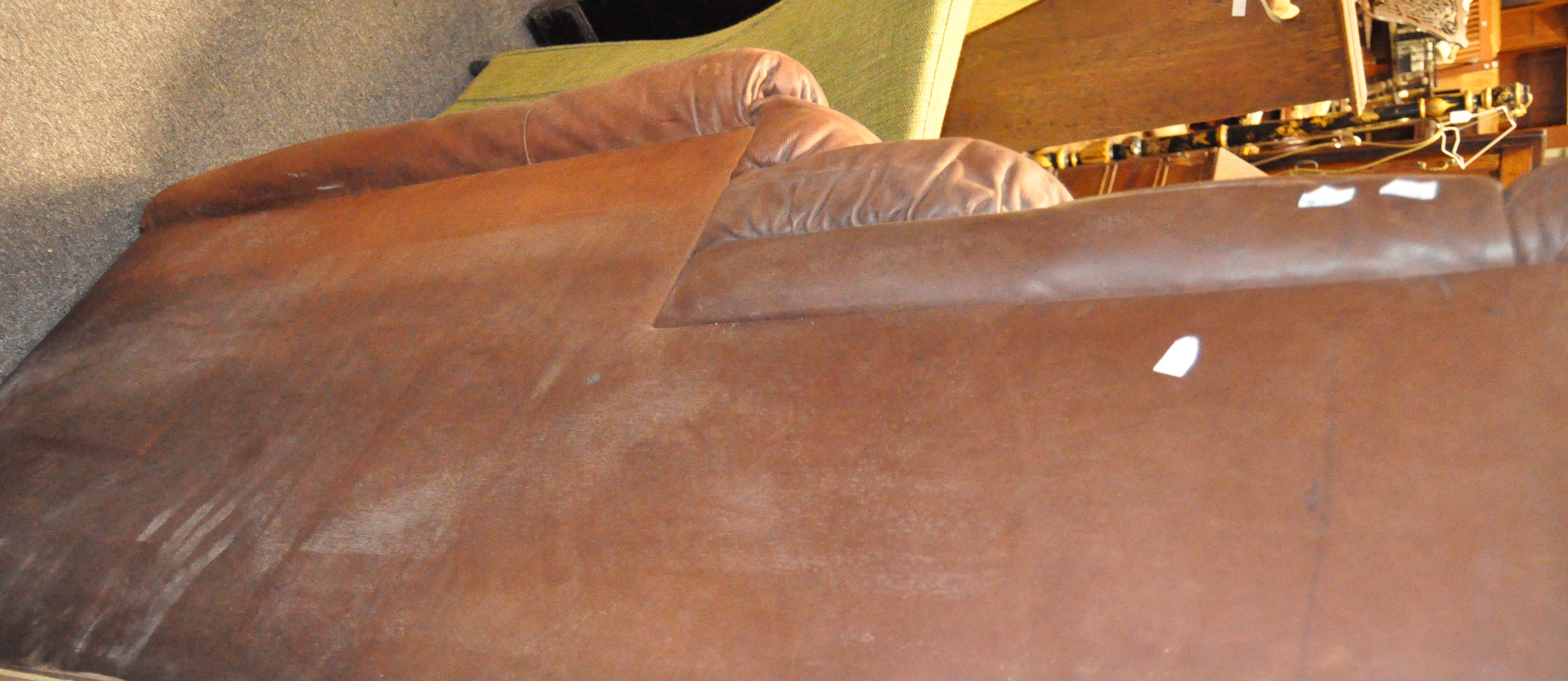 A 20th century vintage leather chaise longue, of rippled form, possibly of Danish design, - Image 4 of 4